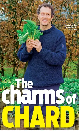  ??  ?? Monty holding Swiss chard in his garden