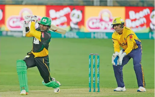  ?? Photo by M. Sajjad ?? Kumar Sangakkara of Multan Sultans plays a shot during the opening PSL match against Peshawar Zalmi at the Dubai Internatio­nal Cricket Stadium. —