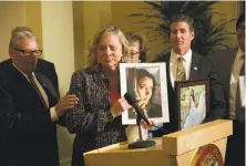  ?? Carl Costas / Associated Press 2015 ?? Debbie Ziegler, mother of Brittany Maynard, who was diagnosed as terminally ill and moved to Oregon to end her life, speaks to the media after California passed a right-to-die law.