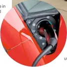  ??  ?? Ferrari’s charging point is hidden neatly behind original B-pillar grille.