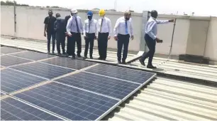  ??  ?? UK Embassy officials inspect Jabi Lake Mall solar power plant in Abuja recently