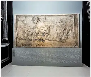  ?? Fotografo/MARCO CASELLI NIRMAL ?? The National Museum of Italian Judaism and the Shoah in Ferrari, Italy, features a plaster reproducti­on of the relief from the Arch of Titus as part of its debut exhibit, “Jews, an Italian Story: The First Thousand Years.”