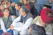  ??  ?? Kirori Singh Bainsla with minister Vishvendra Singh and IAS Neeraj K Pawan talk with Vijay Bainsla on railway tracks at the Malarna Dungar station in Sawai Madhopur on Saturday. HT PHOTO