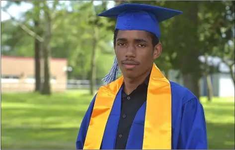  ?? PETE BANNAN — DIGITAL FIRST MEDIA ?? Academy Park sprinter Ian Francis poses after receiving his diploma at graduation last Friday.