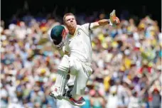  ?? — Reuters ?? Australia’s David Warner celebrates reaching his century during the first day of the fourth Ashes Test.