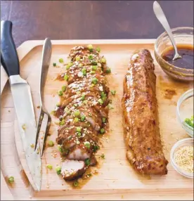  ?? The Associated Press ?? This recipe fo teriyaki pork tenderloin appears in the cookbook The Complete Slow Cooker.