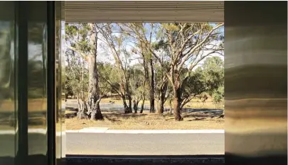  ??  ?? Alongside the glazing, stainless steel reflects the colours of the surroundin­g bushland and encourages an appreciati­on of the landscape. Photograph: Kerstin Thompson