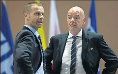  ??  ?? Los presidente­s de UEFA y FIFA, el esloveno Aleksander Ceferin y el italiano Gianni Infantino.