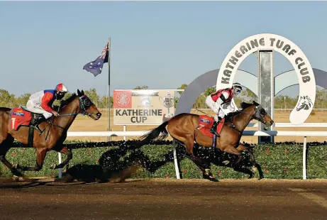  ?? Picture: MICHAEL FRANCHI ?? Grand Teton, ridden by Wayne Davis, powers home to win the $30,000 Katherine Cup yesterday