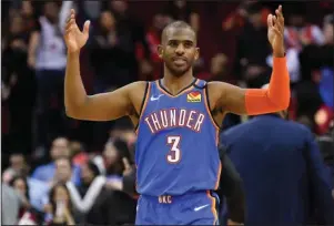  ?? The Associated Press ?? ON THE MARKET: Oklahoma City Thunder guard Chris Paul reacts after the team’s win in a Jan. 20 NBA game against the Houston Rockets in Houston. Paul is one of the many players who will be free agents next year, which could create problems for USA Basketball as it prepares for the Olympics.