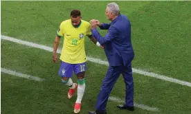  ?? Photograph: Molly Darlington/Reuters ?? Neymar is consoled by the Brazil manager, Tite, as he is substitute­d against Serbia.