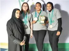  ?? Photo/Supplied ?? The top-three medalists with Dr. Razan Baker, member of the board of directors at the Saudi Bowling Federation.
