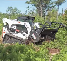  ?? JEFF JENSON ?? The 70-inch forestry cutter is approved for use with M2-Series compact track loaders — T750, T770 and T870 — and the S850 skid-steer loader.