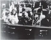  ?? WARREN COMMISSION VIA AP ?? President John F. Kennedy is seen in the rear seat of his limousine during the Dallas, motorcade on Nov. 22, 1963. His wife, Jacqueline, is beside him, and Gov. John Connally of Texas and his wife were in the seats in front of him.