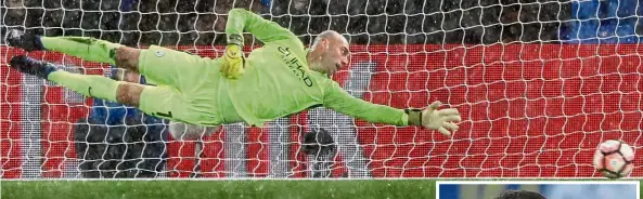  ??  ?? Safer hands: Goalkeeper Willy Caballero has played in Manchester City’s last three matches, with (right) losing his place after going through a difficult spell. — Reuters