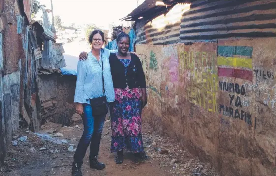  ??  ?? Manaspring­s founder, Gold Coast woman Carey Westwood (left) spends most of the year helping women living in poverty in Nairobi, Kenya.