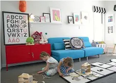  ??  ?? Pictured left and above, before she gave it a make over, the children’s playroom in Vanessa’s home featured bright pink wallpaper, kids’ art on the walls, and a ballet bar to boot.