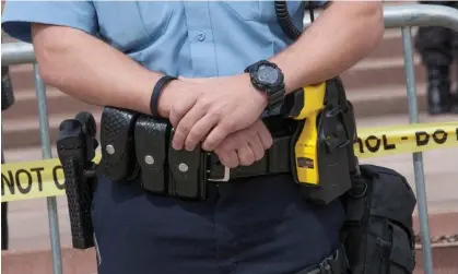  ?? ?? The two parents were arrested, along with one other, as they tried to get to their children toprotect them, authoritie­s said. Photograph: Jim West/Alamy