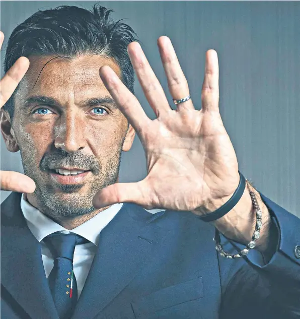  ??  ?? Safe hands: Gianluigi Buffon ended his Italy career with 176 caps; (left) in action for PSG