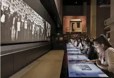  ??  ?? An interactiv­e lunch counter
at the African American History Museum
lets visitors grapple with moral dilemmas of the civil rights
movement.