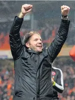  ??  ?? Robbie Neilson celebrates at the final whistle.