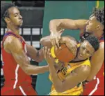  ?? Michael Ainsworth The Associated Press ?? Baylor guard Mark Vital pulls a rebound away from Bishop Gorman product Chase Jeter, right, and Arizona forward Zeke Nnaji in the second half of the Bears’ 63-58 win Saturday at the Ferrell Center.