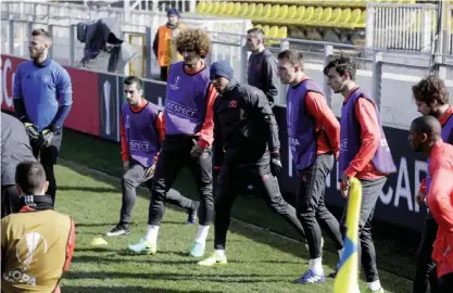  ??  ?? ROSTOV: Manchester United’s players take part in a training session on the eve of the UEFA Europe League round of 16, first leg match between FC Rostov and Manchester United in Rostov yesterday. — AFP