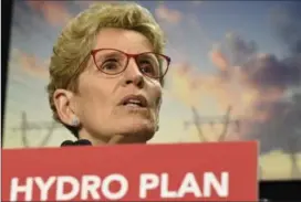  ?? CANADIAN PRESS FILE PHOTO ?? Ontario’s Liberal government has earmarked $5.5 million to advertise cuts to hydro bills — ads the opposition says use public money to make the Liberal party look good.