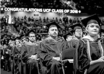  ?? JACOB LANGSTON/STAFF FILE PHOTO ?? UCF has aimed for a 4-year graduation rate of 50 percent but now wants to switch to 47.8 percent. Fall enrollment is likely to top 67,000.