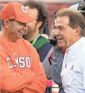  ?? KIRBY LEE/USA TODAY SPORTS ?? PSAs from Dabo Swinney, left, and Nick Saban might carry bigger weight among their schools’ fan base than from other leaders.