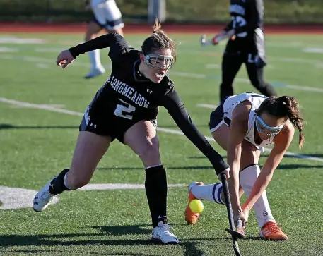  ?? STUART CAHILL / HERALD STAFF FILE ?? FIELD OF EXPANSION: The MIAA Field Hockey Committee voted 13-0 to add a fourth division.