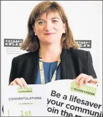  ??  ?? Loughborou­gh MP Nicky Morgan celebrates the achievemen­ts of the town’s Anthony Nolan donors.