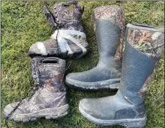  ?? ?? The author’s Itasca Brush Hunter disintegra­ted two hours into its first hunt, but soldiers on thanks to being bound in postal tape. The Irish Setter MudTrek is an excellent boot that got more comfortabl­e with continued wear.
(Arkansas Democrat-Gazette/Bryan Hendricks)