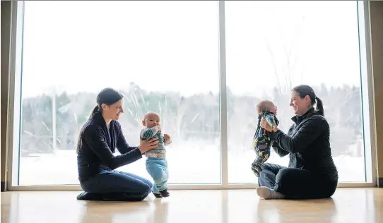  ?? PHOTOS: JUSTIN TANG/MONTREAL GAZETTE ?? Beth Gerow, left, with her son, Tetseek’eh Gerow Isaiah, 9 months, chats with Sophie Roberge and her son, Sully White, 3 months, after a moms and tots fitness group in Wakefield earlier this month. While Gerow has concerns about vaccines, Roberge is...