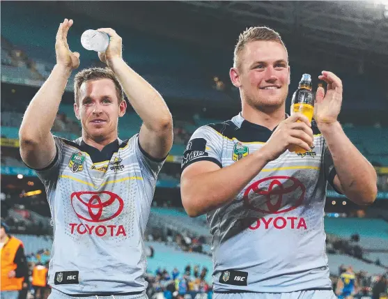  ?? RIDING HIGH: Cowboys teammates Michael Morgan and Coen Hess celebrate victory over the Parramatta Eels at ANZ Stadium on Saturday night. ??