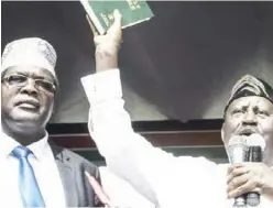  ??  ?? Miguna Miguna (L) played a key role in the "inaugurati­on" of Raila Odinga (R)