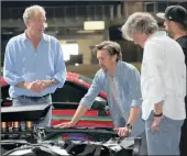  ??  ?? BOORISH: Jeremy Clarkson (left) and his team in Joburg.