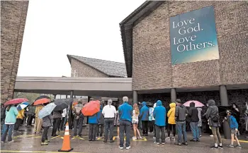  ?? MORRY GASH/AP ?? Churchgoer­s participat­e in a procession Sept. 12 at the Holy Apostles Church in Milwaukee. For decades, Roman Catholic voters have been a pivotal swing vote in U.S. presidenti­al elections, with a majority backing the winner, nearly every time.