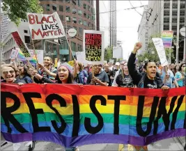  ?? ASSOCIATED PRESS ?? A GROUP OF MARCHERS yell during the Pride parade in San Francisco Sunday.