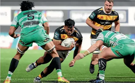  ?? ANDY JACKSON/GETTY IMAGES ?? Millennium Sanarevi, of Taranaki, charges forward during Friday night’s badly lit game.