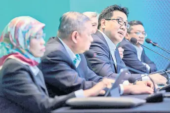  ?? — Bernama photo ?? Petronas president and group chief executive officer Tengku Muhammad Taufik Tengku Aziz speaks during the Petronas Fourth Quarter and Year Ended 2023 Group Financial Results Announceme­nt last Friday.