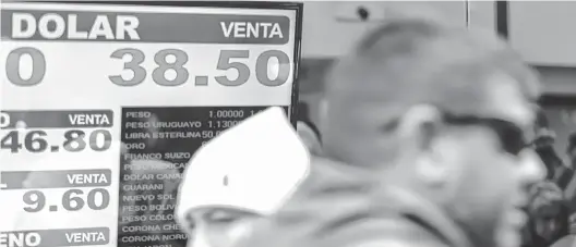  ?? NA ?? en las pizarras de los bancos y casas de cambio de la city porteña mantuviero­n el mismo clima de incertidum­bre que en los días previos.