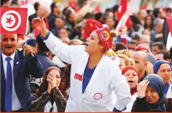  ?? Reuters ?? About 650,000 public sector workers went on strike and thousands protested across Tunisia yesterday over the government’s refusal to raise wages amid threats from internatio­nal lenders to stop financing Tunisia’s tattered economy. Schools, universiti­es, municipali­ties and ministries were shut and hospitals were on emergency staffing in the nationwide walkout organised by the UGTT union, the biggest strike action in Tunisia in five years.