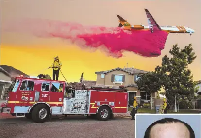  ?? AP PHOTO, ABOVE; PHOTO, RIGHT, BY ORANGE COUNTY SHERIFF'S DEPARTMENT VIA AP ?? COURT DELAY: A plane drops fire retardant behind homes in Lake Elsinore, Calif., as the Holy Fire burned near homes Wednesday. Forrest Clark, right, is charged with setting the blaze.