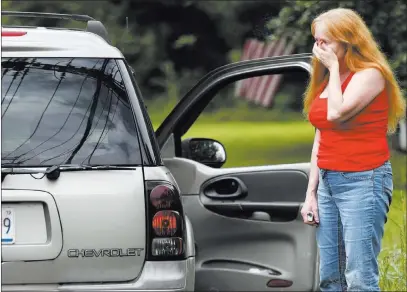  ?? Steve Ruark ?? The Associated Press Shirley Pollack reacts to news of a shooting with multiple victims Thursday at a warehouse in northeaste­rn Maryland.