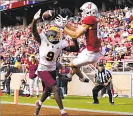  ?? Jeff Chiu Associated Press ?? ARIZONA STATE defensive back Ro Torrence (9) prevents a potential catch for a touchdown by Stanford receiver Brycen Tremayne in the second half.