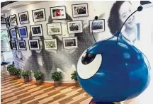 ??  ?? Waiting approval: A mascot of Ant Financial is seen at its office in Hangzhou. A number of companies have said that their deals are before CFIUS and they include Ant Financial’s acquisitio­n of MoneyGram.