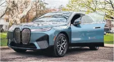  ?? ?? Following an applicatio­n process, Adrian Lazarovits was chosen to be one of the first Canadians to own the 2023 BMW iX.