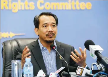  ?? HENG CHIVOAN ?? The president of the government’s Human Rights Committee, Keo Remy, speaks to the press about a recent APHR report yesterday in Phnom Penh.