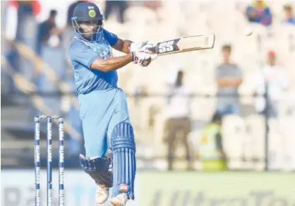  ?? Agence France-presse ?? India’s Ambati Rayudu (right) plays a shot during the fourth ODI against the West Indies at the Brabourne Stadium in Mumbai on Monday.